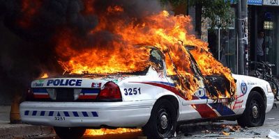 police-car-on-fire-min